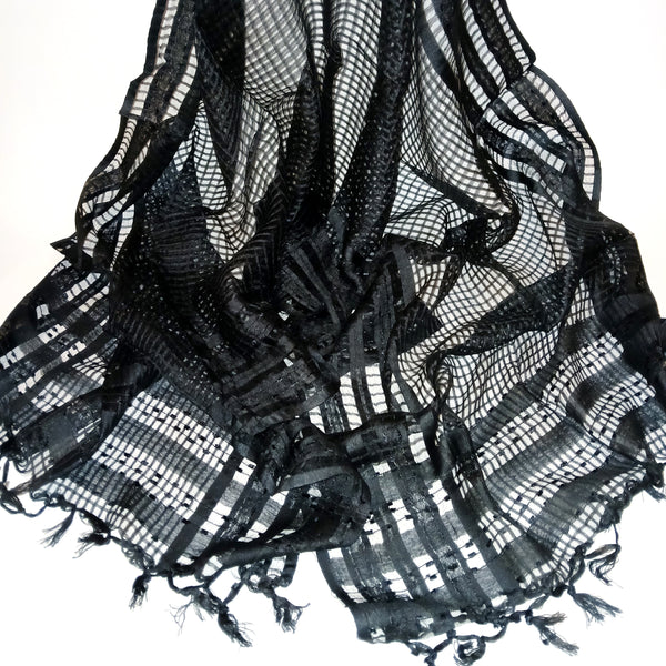 Sheer scarf in black with subtle square windowpane weave, available at Cerulean Arts.