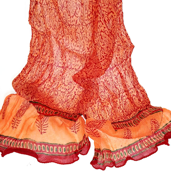 Block print scarf in papaya orange available at Cerulean Arts.