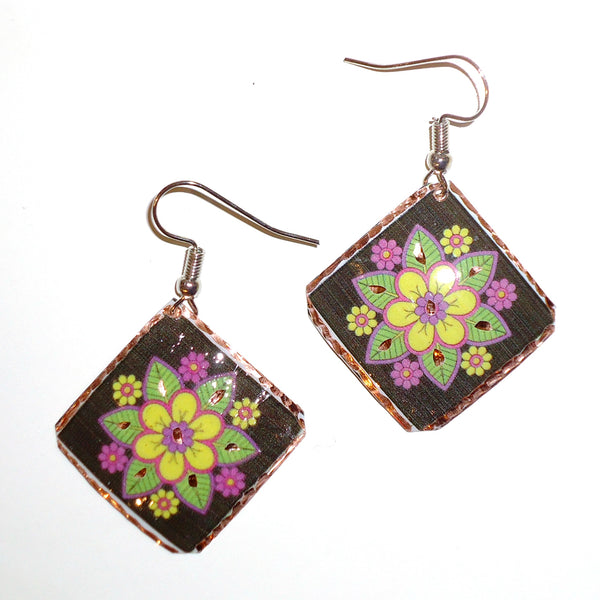 Etched copper floral earrings with black diamond design available at Cerulean Arts.