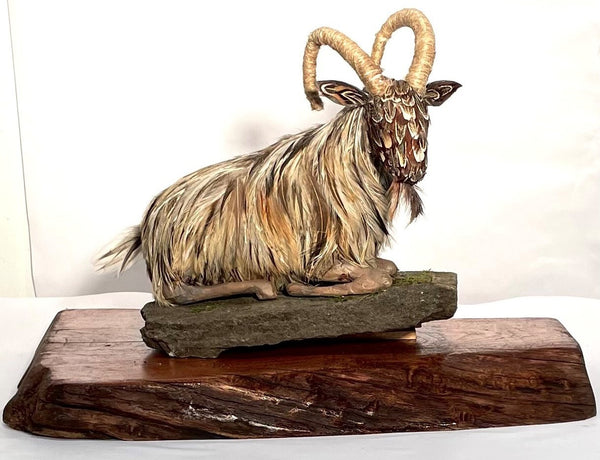 Time Out, feathers and mixed media sculpture by Cerulean Arts Collective Member Alysa Bennett.  