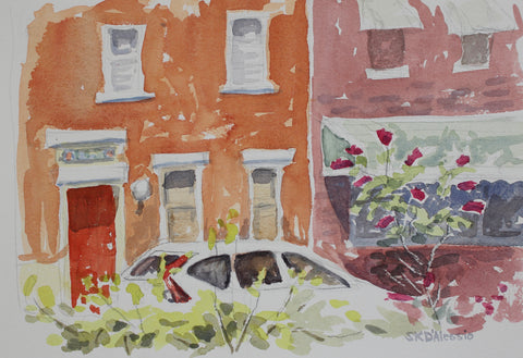 White Car with Red Bush, watercolor on paper cityscape painting by Cerulean Arts Collective Member Susan K. D'Alessio.